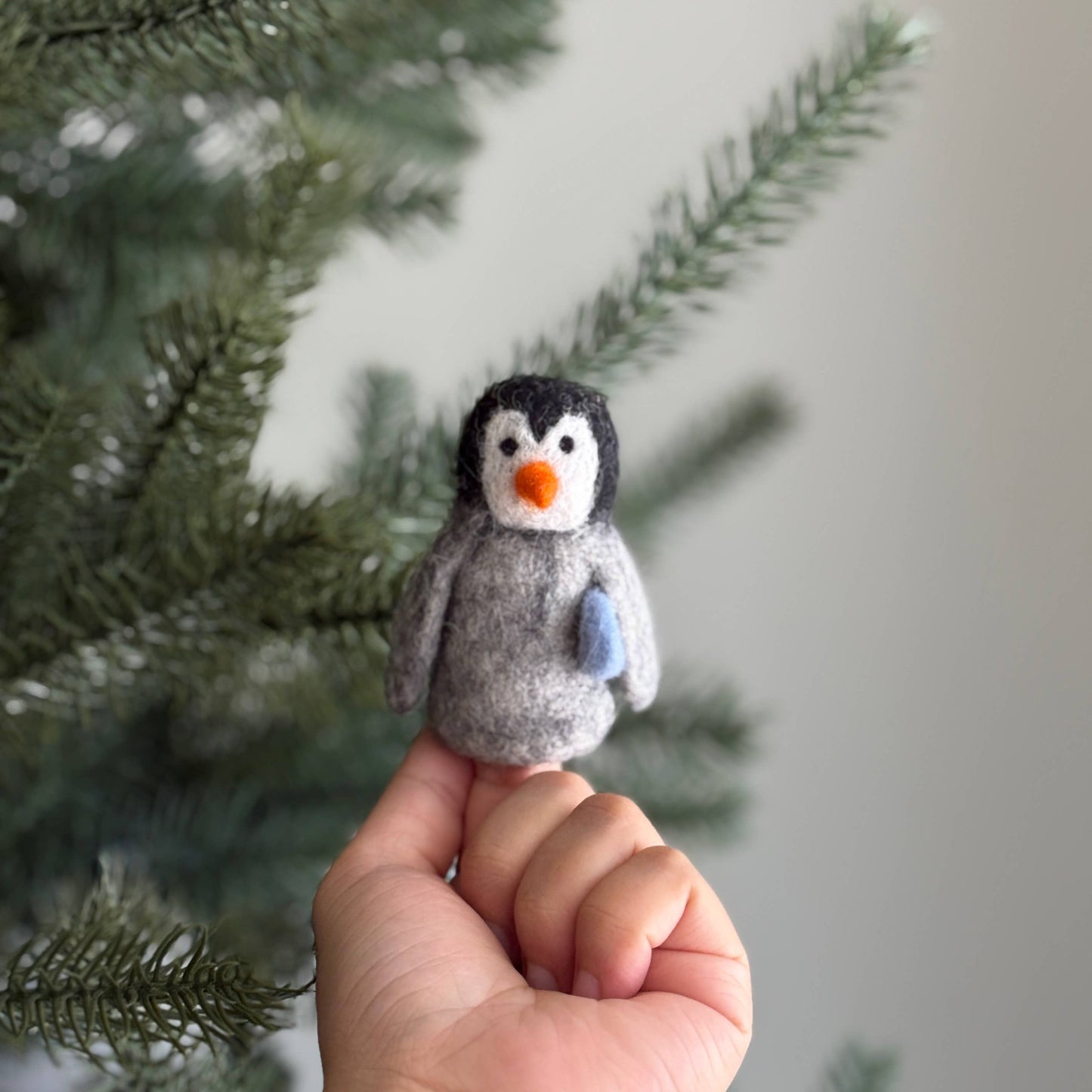Felt Penguin Carrying A Fish Finger Puppet
